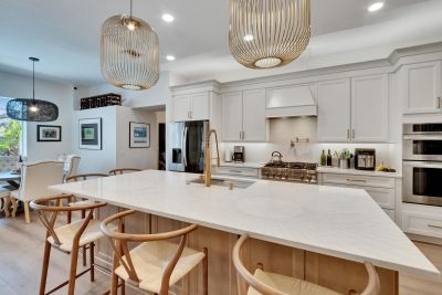 Modern kitchen with island sink. 